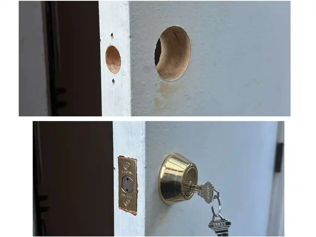 High-security deadbolt with Medeco keys installed on a white door